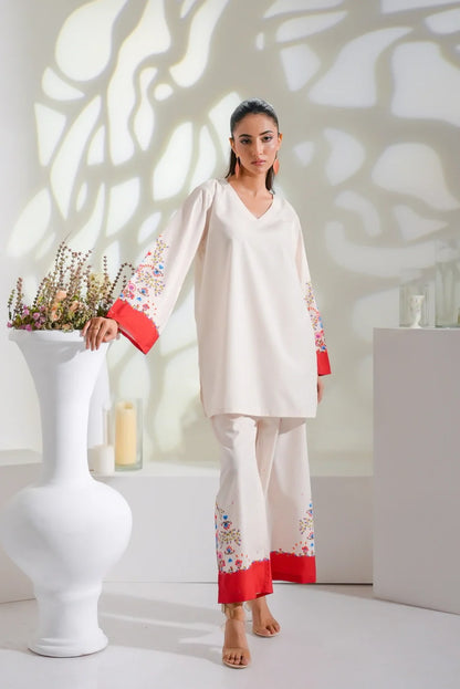Dhaga white kurta and pajama set with red-trim floral borders at cuffs and hem