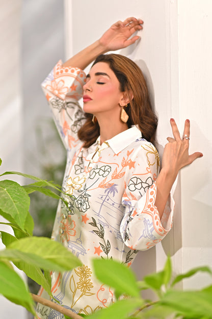 Women’s printed kurta sleeve detail, white fabric with multicolor floral and border trim