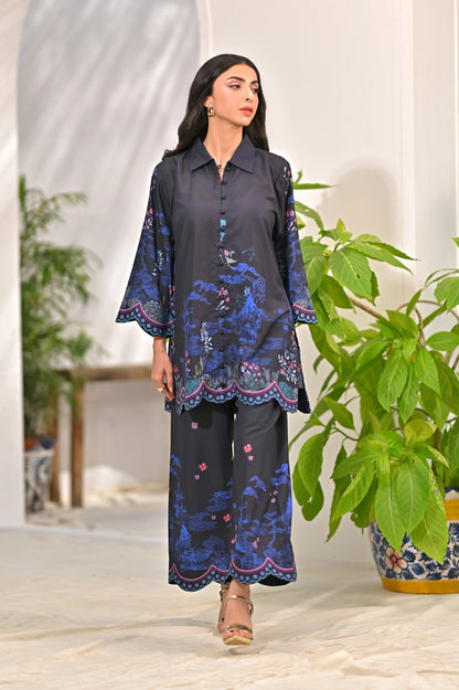 Women's dark kurta and pants set with blue floral border print