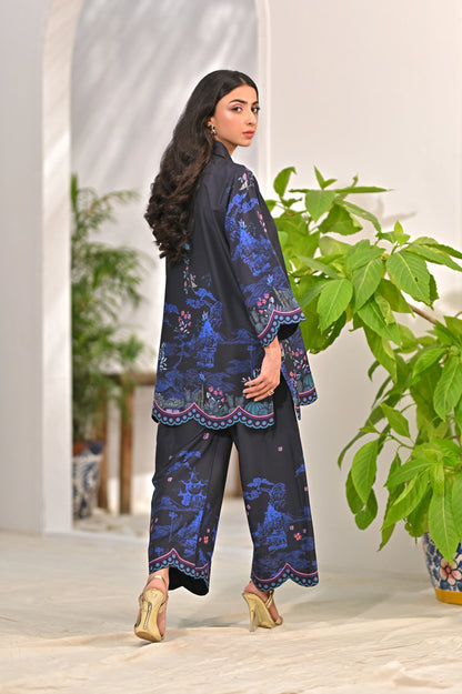 Women's dark printed kurta and straight pants set with blue floral trim