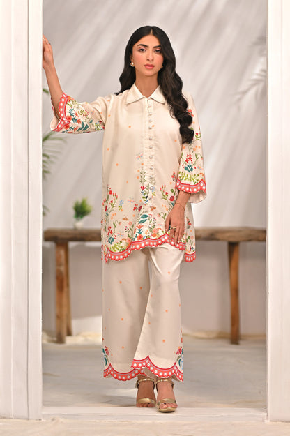 Floral embroidered kurta and pants set with coral scalloped hem trim