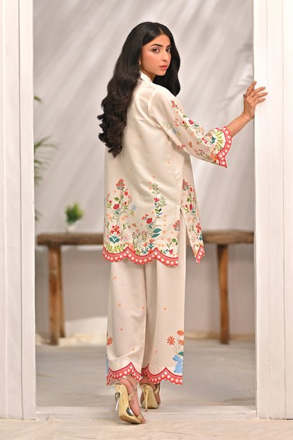 Floral embroidered kurta and pants set, button-front tunic with coral trim