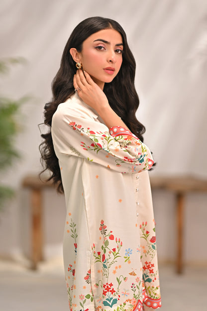 Floral embroidered kurta and pants set with coral-trim cuffs and neckline