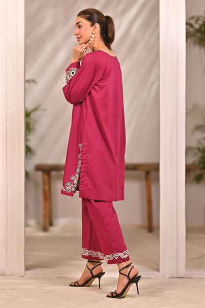 Women’s magenta kurta and pants set with white embroidery on back yoke and cuffs