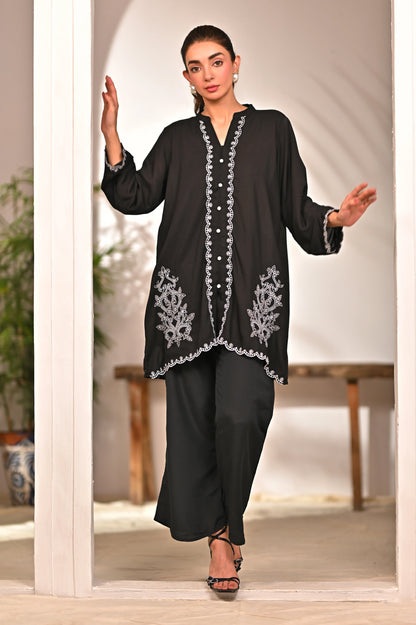 Women’s black embroidered tunic and pants set with scalloped trim
