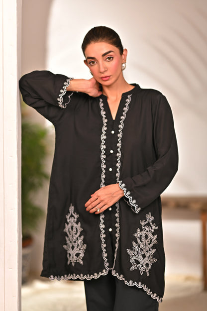 Women’s black embroidered tunic with scalloped button placket