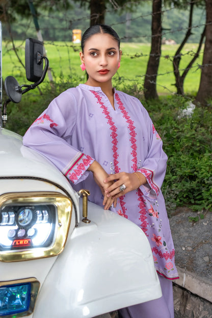 Lavender printed kurta with pink floral border on V-neck and cuffs, three-quarter sleeves