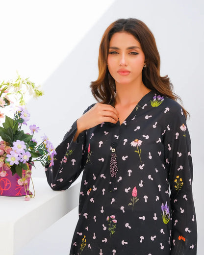 Black printed long kurta with button-front and long sleeves, floral accents