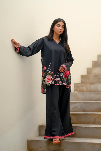 Dhaga black V-neck tunic with long sleeves, floral hem; matching black pants