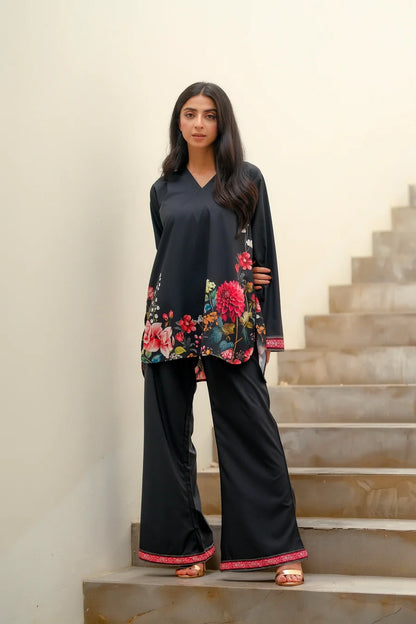 Dhaga black V-neck tunic with colorful floral panel; wide-leg black pants