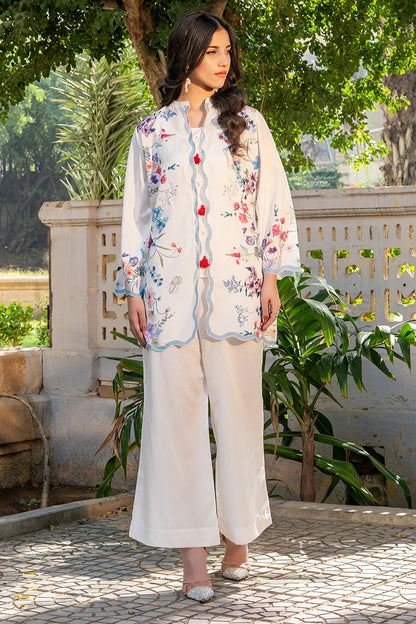 Printed white kurta with long sleeves and wide-leg pants, colorful front floral motif