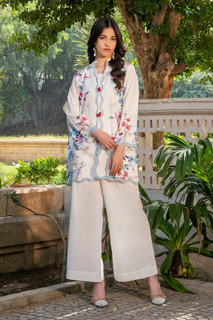 Printed white kurta with long sleeves and wide-leg pants, colorful floral splash print