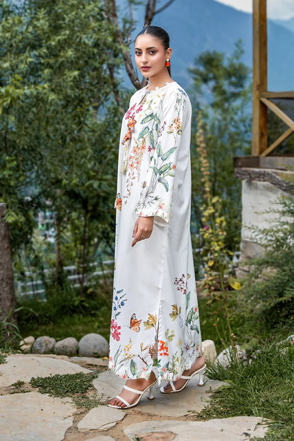 White floral maxi dress, full-length with long sleeves and flowing silhouette