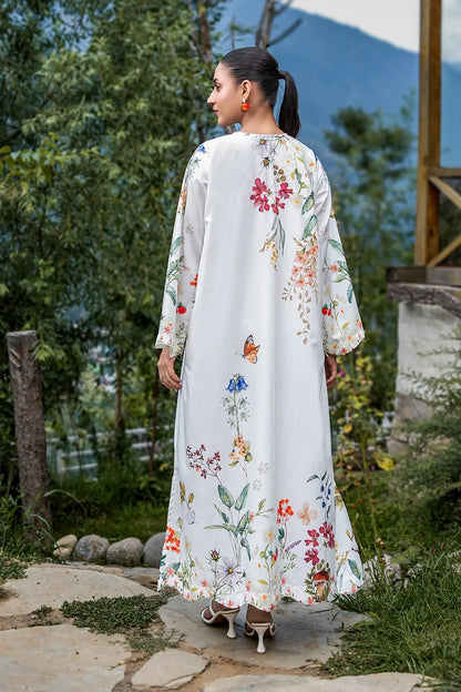 White floral maxi dress with all-over botanical print and long sleeves, back view