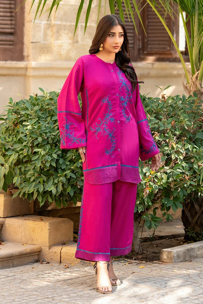 Fuchsia embroidered long tunic kurta with matching straight-leg pants and contrast border