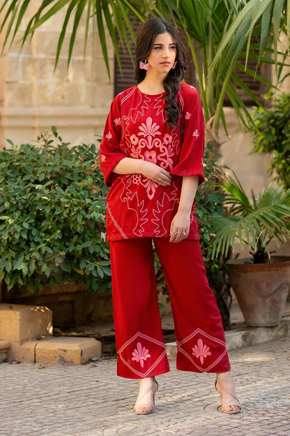 Dhaga red embroidered kurta with wide hem and matching pants, side view