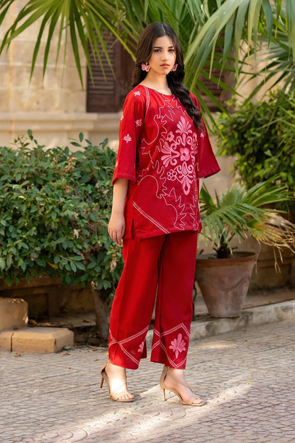 Dhaga red embroidered tunic kurta and matching ankle pants with floral motifs