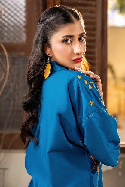 Women’s blue printed kurta top with high collar and long sleeves, side view