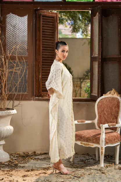 Off-white embroidered long dress with cape sleeves, side profile