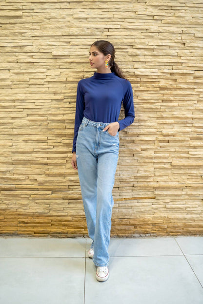 Blue long-sleeve turtleneck top with a slim, body-skimming silhouette