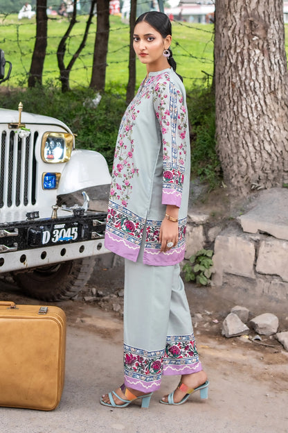 Floral long tunic kurta with purple trim, side view, matching light blue pants