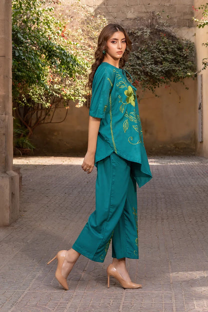 Teal floral printed tunic with draped side hem and wide-leg pants