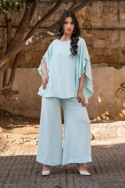 Womenâ€™s light-blue two-piece kurta set with round neck and flowy batwing sleeves
