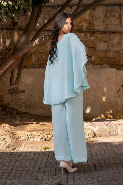 Womenâ€™s light-blue kurta set, side view, draped sleeves and wide-leg pants