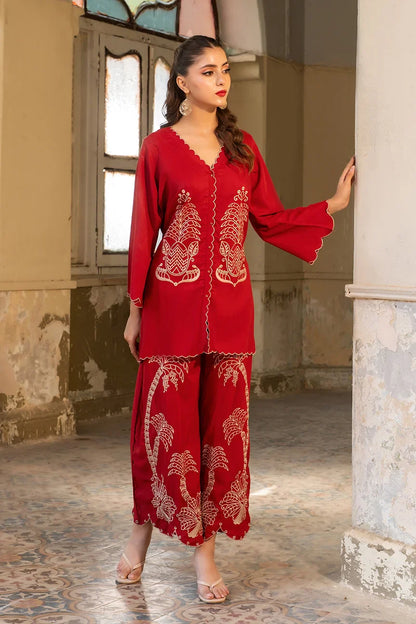 Red embroidered long kurta set with scalloped neckline and three-quarter sleeves