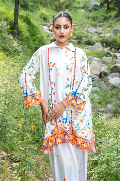Embroidered white long kurta with multicolor chain-style trim along neckline and sleeves
