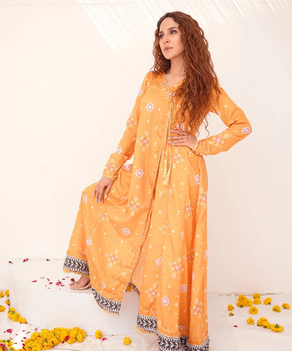 Orange printed long dress with long sleeves, tie waist, black-white hem trim