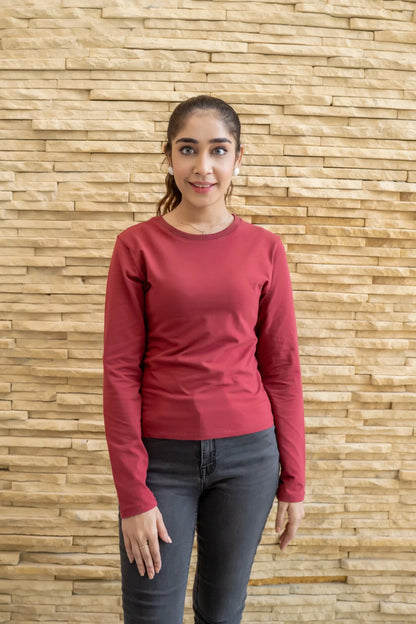 Women's maroon long-sleeve top with crew neck and straight hem