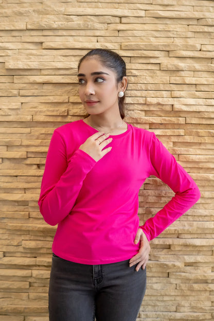 Fuchsia long-sleeve womenâ€™s top with round neckline and defined cuff