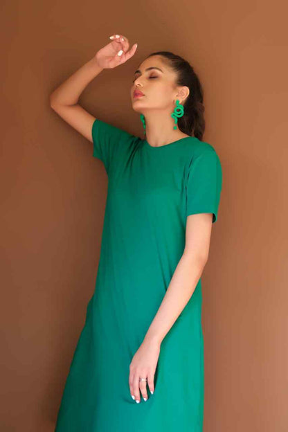 Green short-sleeve midi dress viewed from the back, with round neckline and straight hem.