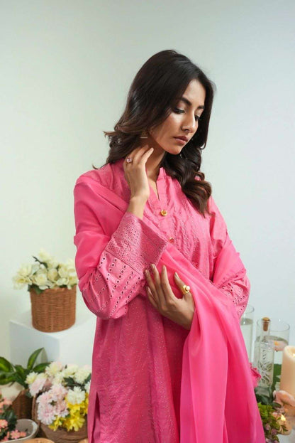 Pink embroidered long tunic with stand collar, button placket, long sleeves.