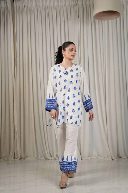 Women’s white kurta with blue border print and matching ankle-length pants set