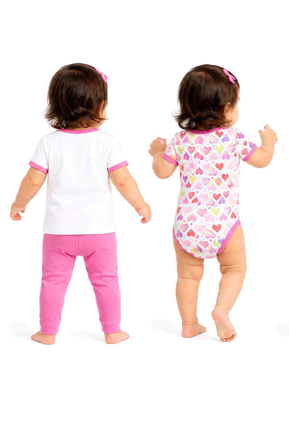 Back view: white top with pink leggings; pink heart-print romper with hat
