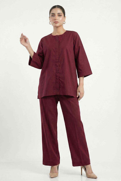Dark maroon kurta-style tunic with wide neckline and matching wide-leg cropped pants