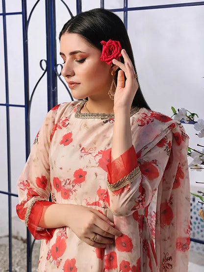 Floral dress and dupatta close-up: off-white fabric with red print, gold-edged neckline