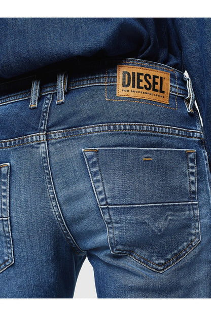 Blue denim jeans with DIESEL logo patch on the waistband
