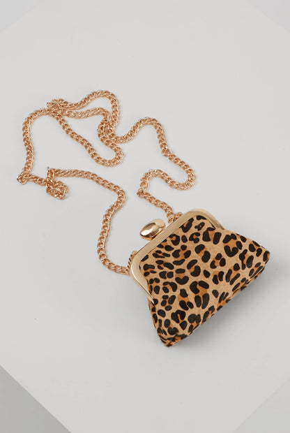 Leopard-print mini handbag with gold clasp and dangling gold chain strap