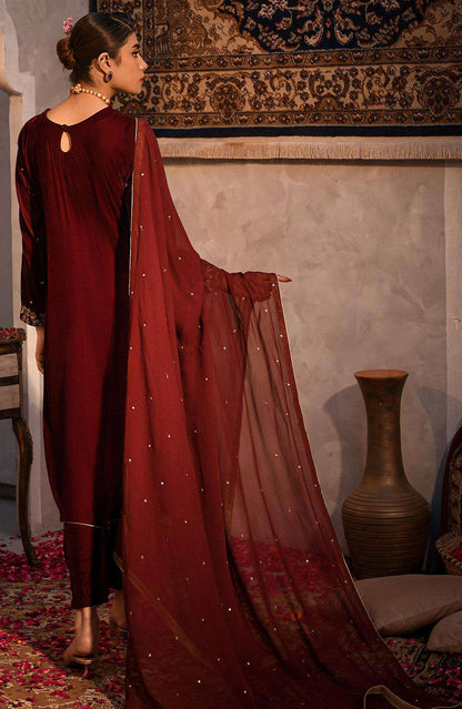 Maroon long kurta with gold speckled embroidery; flowing maroon dupatta