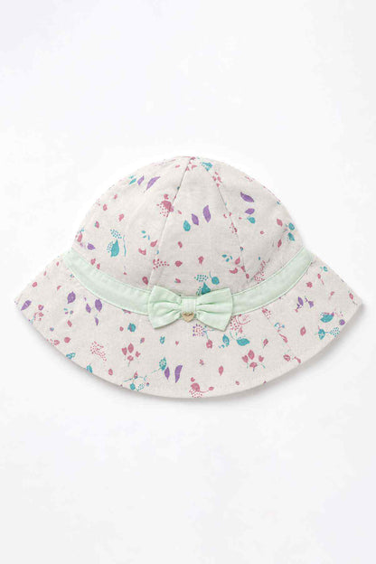Kids bucket hat with colorful paint-splatter print and mint bow trim