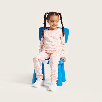 Kids' pink dotted long-sleeve pajama set with matching pants