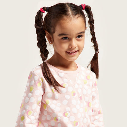 Kids' pink dotted long-sleeve pajama top with crew neck