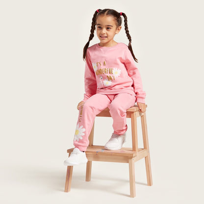 Pink kids sweatshirt and jogger set with long sleeves and “wonderful” graphic