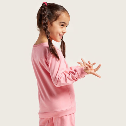 Pink kids crew-neck sweatshirt with long sleeves, side view