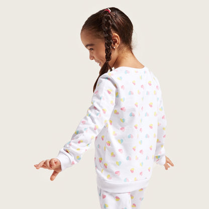 Kids pajama top in white with multicolor heart pattern, long sleeves, back view