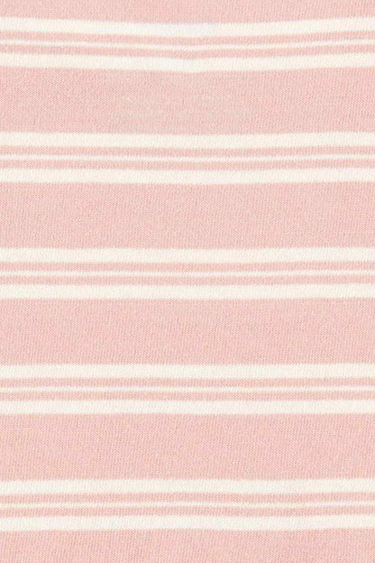Pink and white horizontal stripe knit fabric close-up
