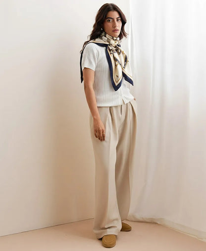 Short-sleeve button-up shirt in white ribbed knit with collar and front buttons